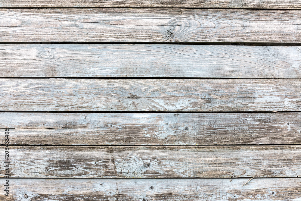 striped grungy grey wooden boards background with peeling off paint striped grungy grey wooden boards background with peeling off paint
