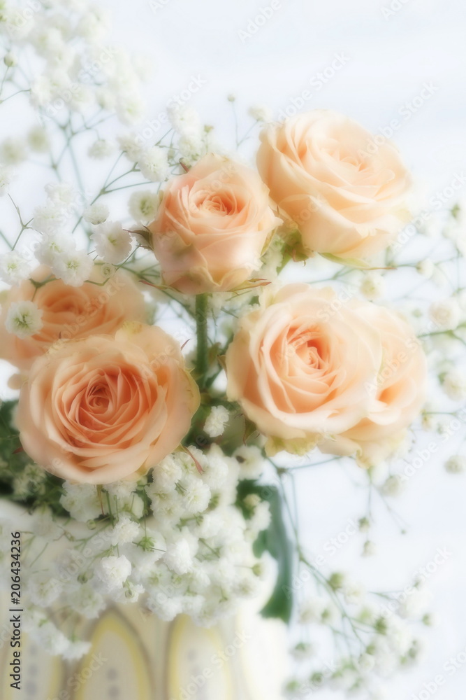Blur effect, soft focus flowers background with bouquet of pale pink  roses.Close up. Beautiful Holiday background