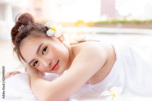 Charming beautiful woman get long weekend holiday in summer season. Attractive beautiful lady use service of aromatherapy shop at luxury resort, hotel or spa. Gorgeous girl feel happy, satisfy service