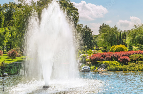 Fountain on the lake in the landscape park Mezhigirya near Kiev, Ukraine.