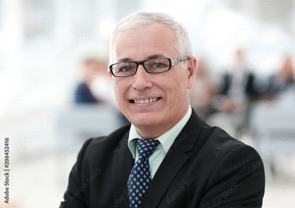 Fototapeta premium close up portrait of senior businessman in office