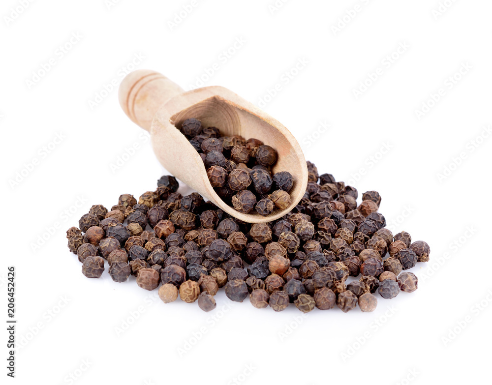 coriander seed in wooden scoop isolated on white background coriander seed in wooden scoop isolated on white background