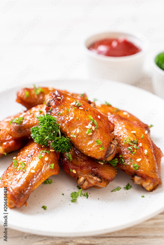 barbecue chicken wings with white sesame barbecue chicken wings with white sesame