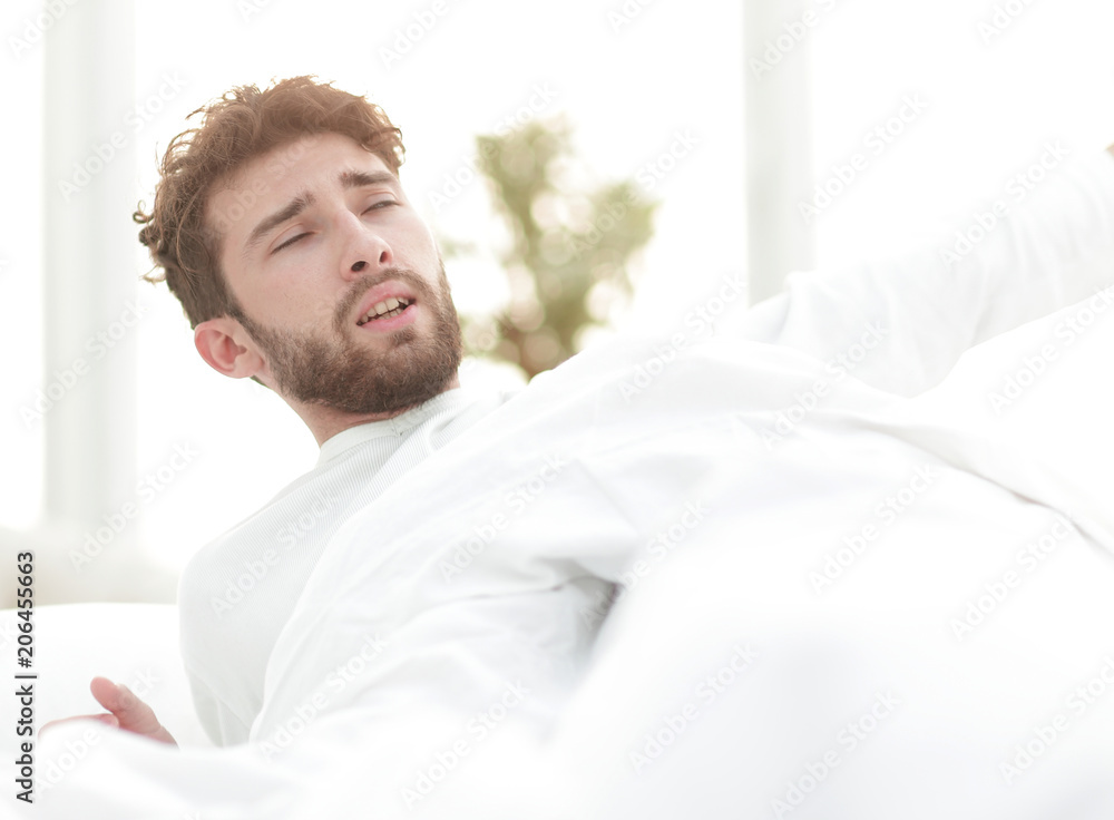 closeup.tired man sleeping on the bed. closeup.tired man sleeping on the bed.
