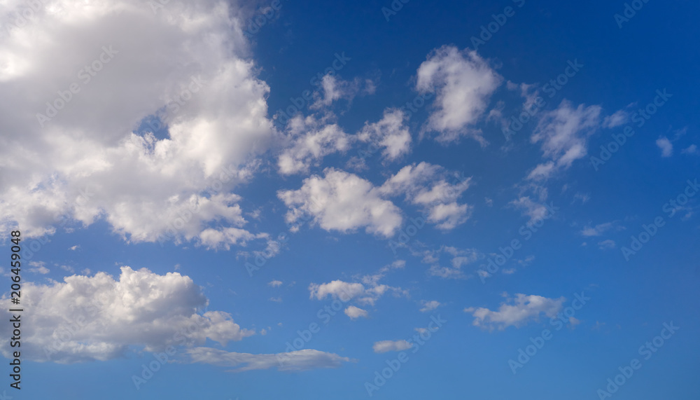 cumulus clouds perfect white in blue sky