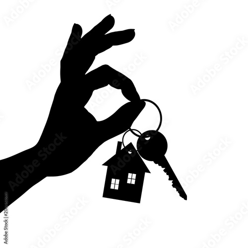 Vector silhouette of hand show of keys from the house on white background.