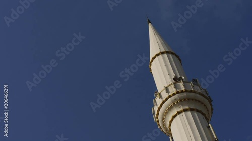 Mosque minaret with time lapse clouds