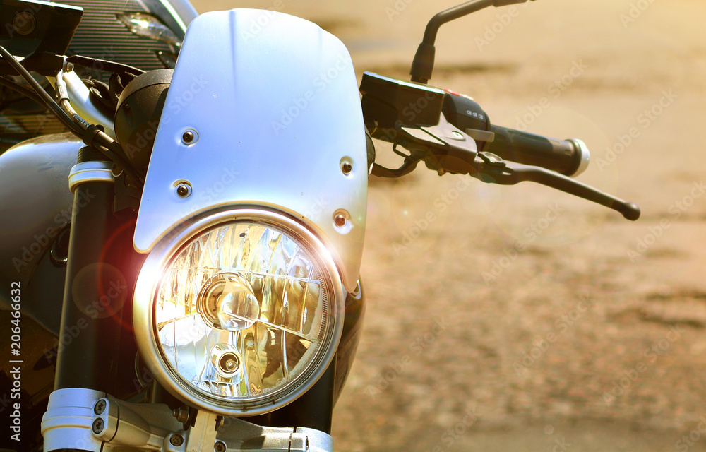 Fototapeta premium Motorcycle headlamp. Closeup detail of motorbike.