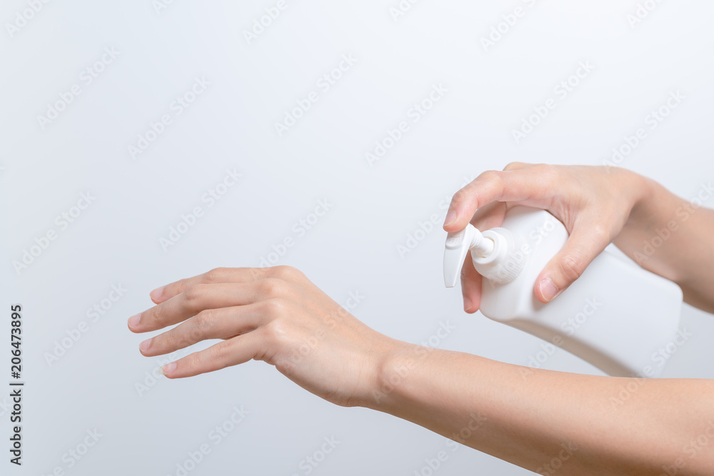 Body Lotion Skin Care Apply. women hands holding body cream pump bottle. Beauty And Body Care Concept Body Lotion Skin Care Apply. women hands holding body cream pump bottle. Beauty And Body Care Concept