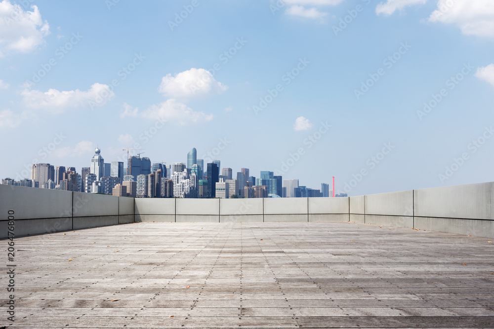 cityscape of modern city from empty square