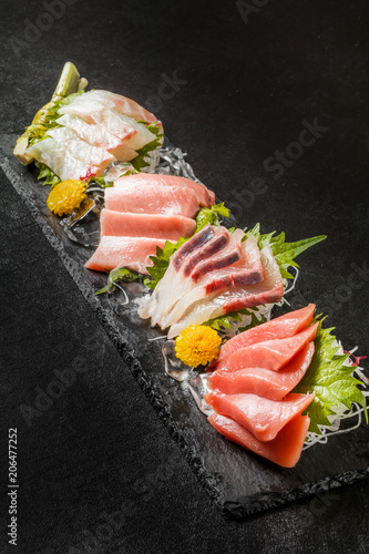 お刺身 sashimi (raw sliced fish, shellfish or crustaceans)
