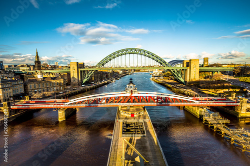 View of Tyne and Swing bridges across river Tyne, Newcastle upon Tyne photo