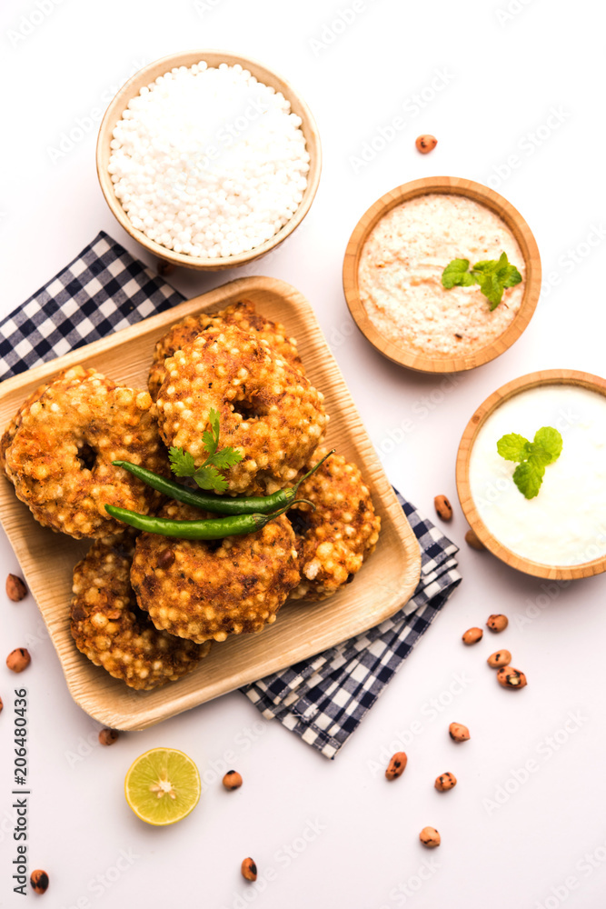Ragda Pattice is a popular Street food or chat made of potato Patties. served in a steel plate, bowl or ceramic plate with tamarind and cilantro chutney Ragda Pattice is a popular Street food or chat made of potato Patties. served in a steel plate, bowl or ceramic plate with tamarind and cilantro chutney