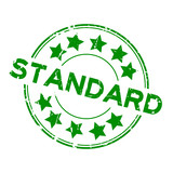 Grunge green standard wording with star icon round rubber seal stamp on white background