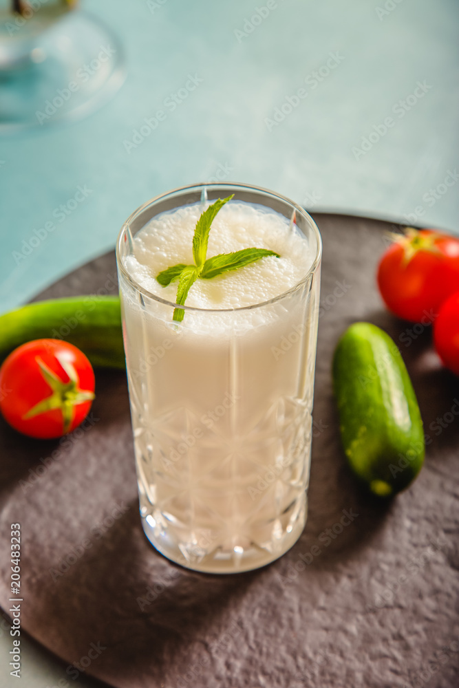 Ayran - liquid drink made from yogurt in ransparent glass cup
