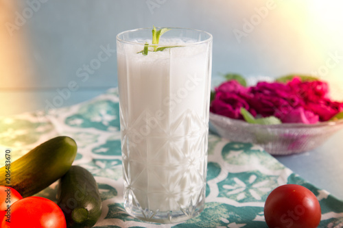 Ayran - liquid drink made from yogurt in ransparent glass cup