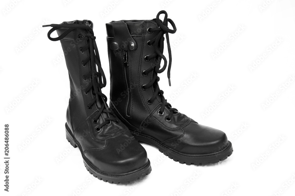 military boots black on the lock and with rivets, sole with a pattern, legs for protection of legs