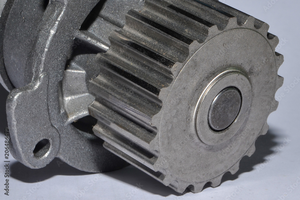 detail for the repair of a machine, a product with a gear of metal, a spare part on a white background, detail for the repair of a machine, a product with a gear of metal, a spare part on a white background,