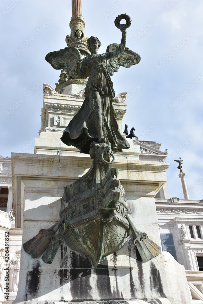 Obraz premium The Altare della Patria or Il Vittoriano, is a monument built in honor of Victor Emmanuel, the first king of a unified Italy, located in Rome. Partial view