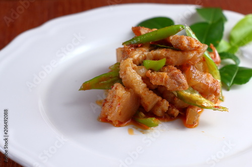 spicy pork with red curry in thai food