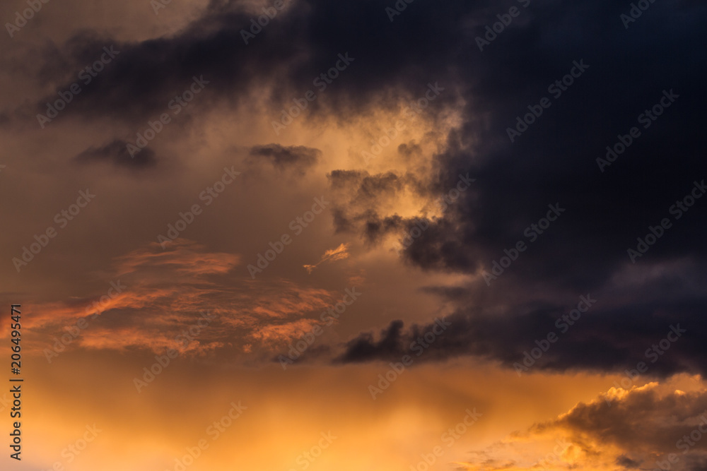 Fototapeta premium Amazing colored sky at sunset, artistic and mystical sky background, art in sky, warm orange sky, natural abstract art , fire in the sky