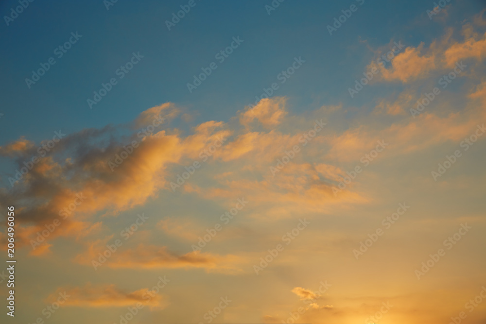 Sunset sky orange clouds on blue sky