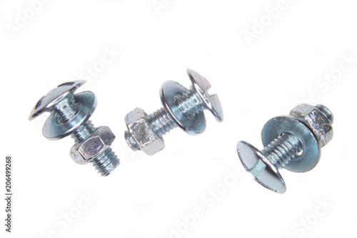 Metal nut and screw on a white background