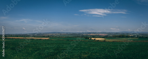 Panoramic view of the Irish countryside fields of green on a sunny day
