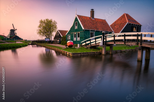 Photography Sunset over historic houses and windmills of Zaanse Schans in the Netherlands
