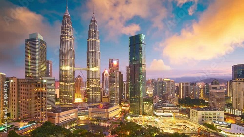 Beautiful Kuala Lumpur city skyline with dramatic sky , twilight scene . Malaysia .