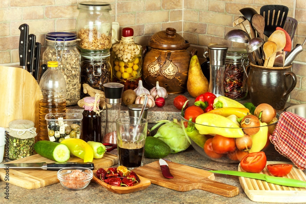 Preparation of vegetable salad in the kitchen. Fresh vegetables on a kitchen board. Healthy diet food.