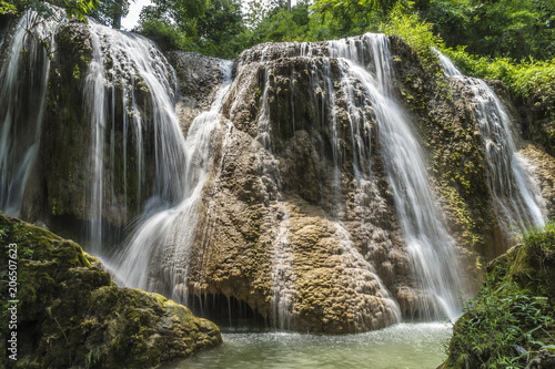 soft water of the stream in the natural park  Beautiful waterfall in rain forest