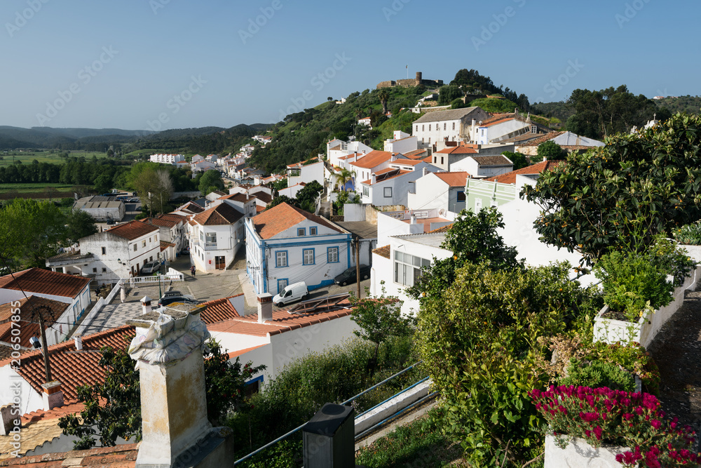 Panoramic view of Aljezur town with the Castle of Aljezur is visible in the background. Aljezur is a small market town in Algarve, Portugal.