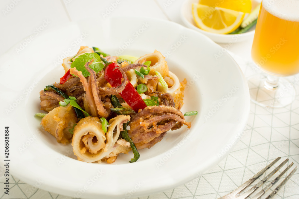 Fried Squids Tentacle Calamari with Chili Pepper and Mint Leaves Fried Squids Tentacle Calamari with Chili Pepper and Mint Leaves