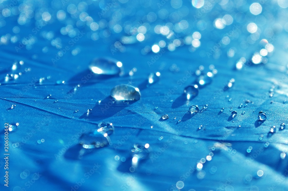 water drop on blue tent in summer  travel after rain in the morning