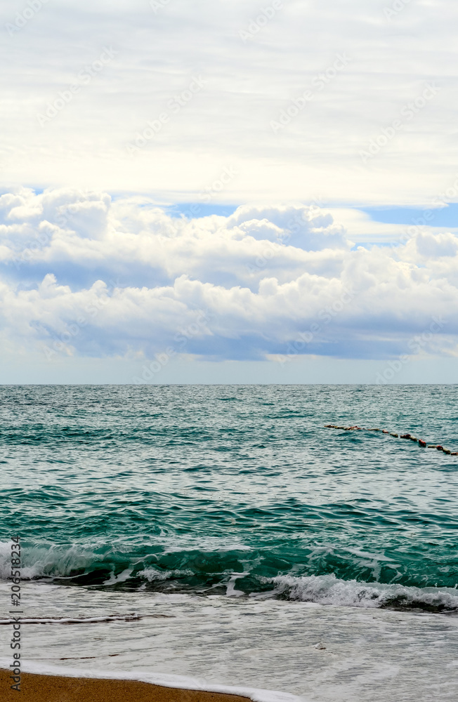 Montenegro. Beautiful sea view. The azure sea and white clouds over the sea. Montenegro. Beautiful sea view. The azure sea and white clouds over the sea.