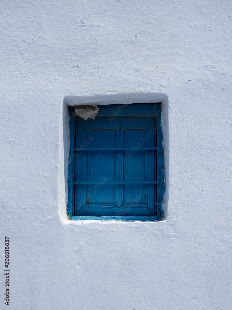 Details of a small blue window in Amorgos Details of a small blue window in Amorgos