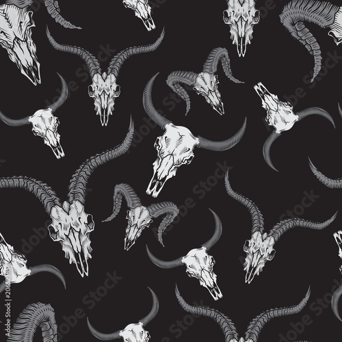 Seamless pattern with animal stock skulls illustrations in engraving technique.
