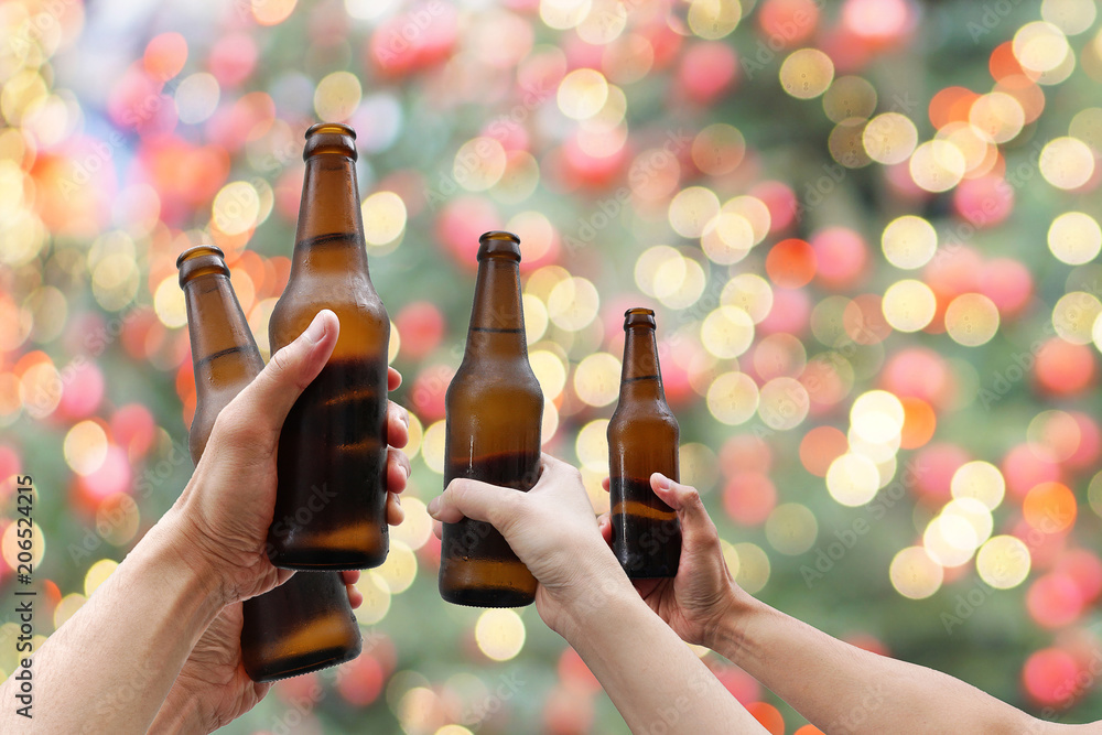 Hands Holding Beer Bottles And Happy Enjoying Harvest Time Together To Clinking Glasses At Outdoor Party On Beautiful Bokeh Night Light Background Celebration Drinking Beer In Pub Bar Stock Photo Adobe Stock Hands Holding Beer Bottles And Happy Enjoying Harvest Time Together To Clinking Glasses At Outdoor Party On Beautiful Bokeh Night Light Background Celebration Drinking Beer In Pub Bar Stock Photo Adobe Stock