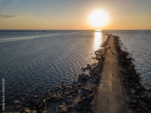 drone image. aerial view of sunset in the sea by the sea gates