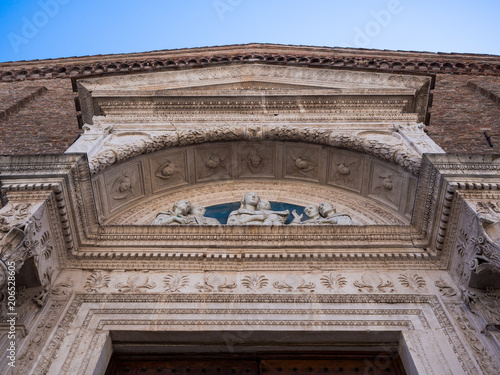 Detail of the carved facade of an Italian medieval church.