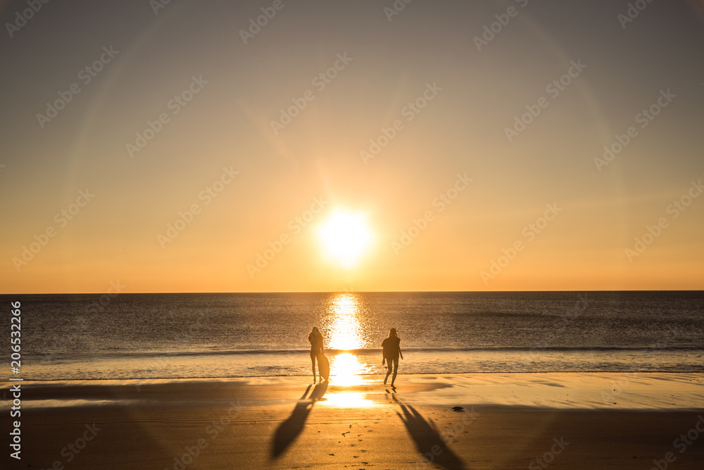 Two Friends Playing on the beach