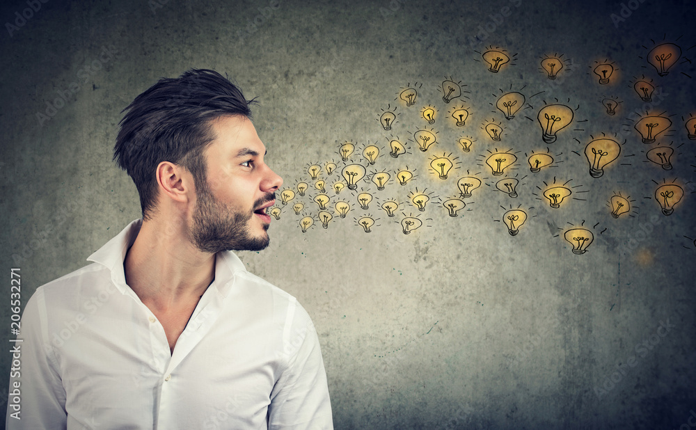 Erudite man talking spreading smart ideas with light bulbs coming out of his mouth Erudite man talking spreading smart ideas with light bulbs coming out of his mouth
