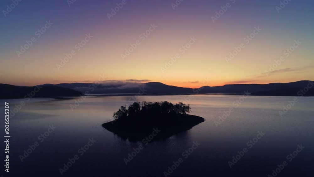 Morning fog on the mountain lake, sunrise shot Morning fog on the mountain lake, sunrise shot