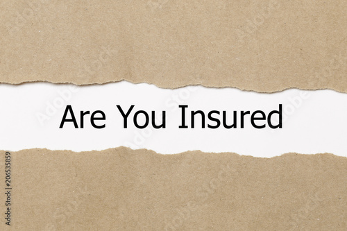 are you insured written under torn paper. Insurance concept