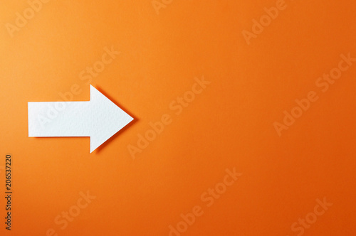 one solid arrow on orange background © Miguel Á Padriñán A
