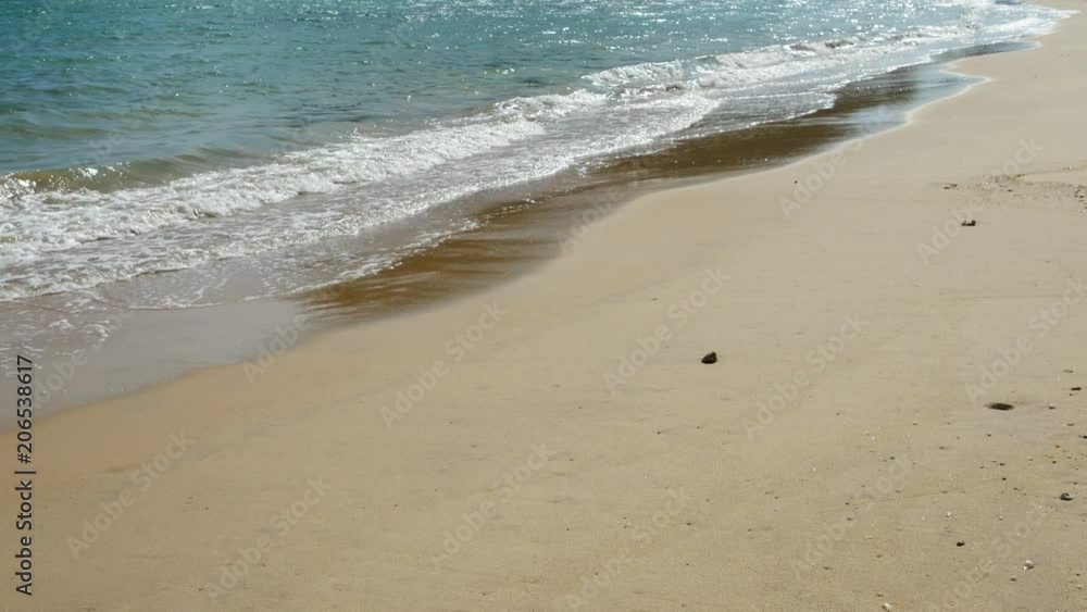 Beautiful sand beach with soft wave in sea water , cloudy blue sky sunny day Beautiful sand beach with soft wave in sea water , cloudy blue sky sunny day