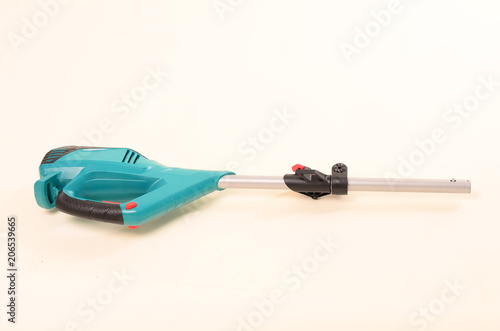 Protective cover on the new weed trimmer, lawn mower, brush cutter, closeup, isolated on white background, clipping path included photo