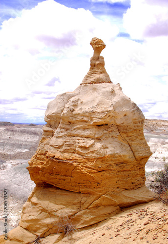 Pocked and weathered sandstone formation like a cathedral in the Bisti Badlands of North West New Mexico.