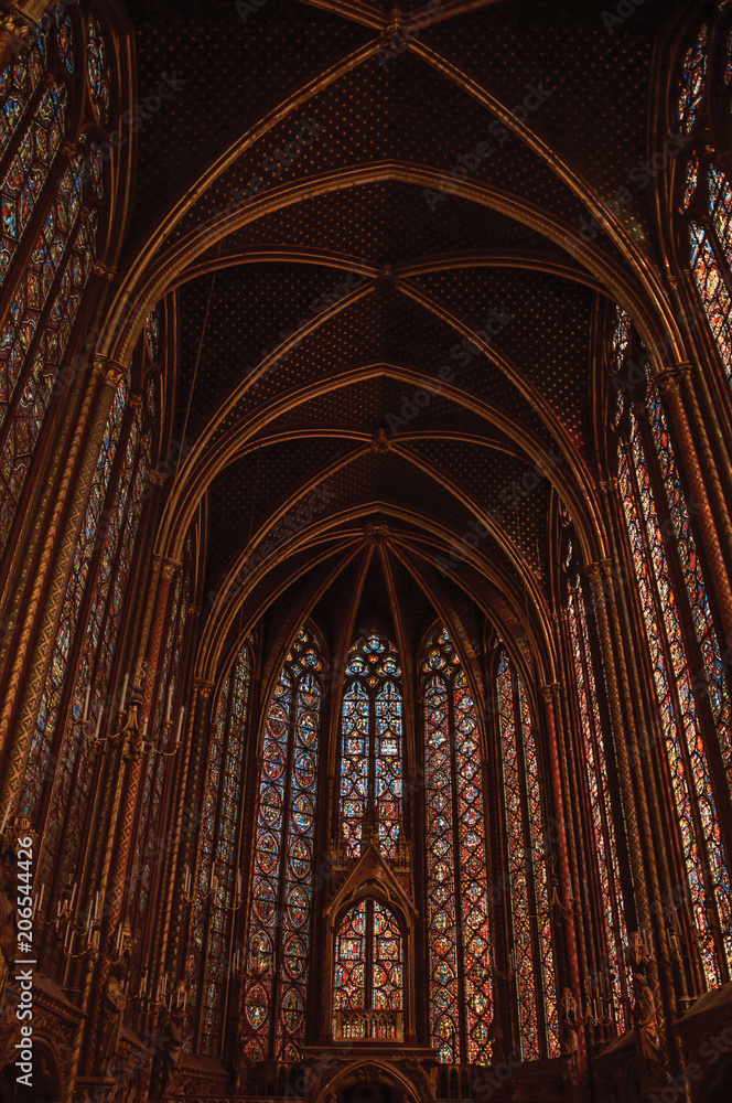 Colorful stained glass windows at the gothic Sainte-Chapelle (church) in Paris. Known as the “City of Light”, is one of the most awesome world’s cultural center. Northern France.
